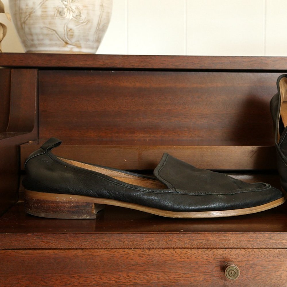 Black leather flats